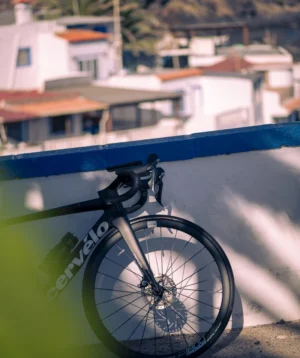 Road Bike Leaning Against a Railing in El Varadero