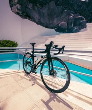Road Bike Parked by a Pool