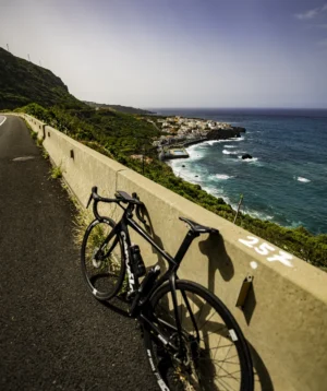 Road Bike Parked on a Road by the Ocean
