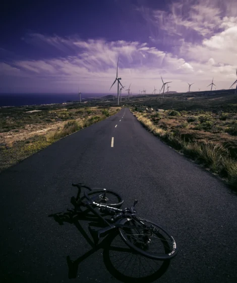 Road Bike with Wind Turbines in the Background