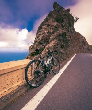 Road Bike Parked on a Road by a Cliff