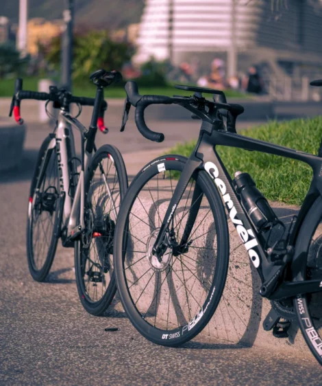 Group of Road Bikes Parked on a Sidewalk