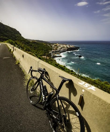 Road Bike Parked on a Road by the Ocean in Tenerife