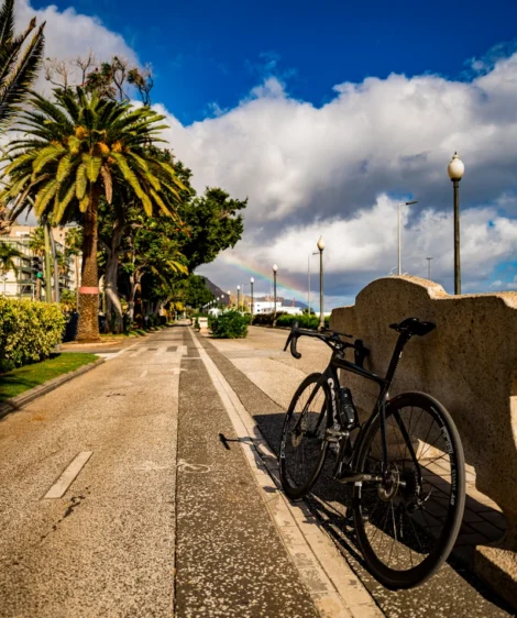 Road Bike Parked on a Sidewalk Near a Bike Lane