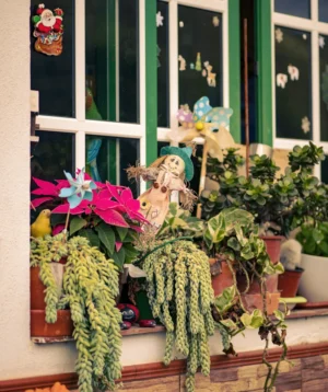 Statue of Person Holding Flowers
