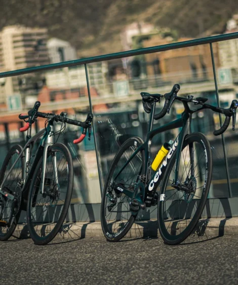 Group of Bikes Parked on Sidewalk
