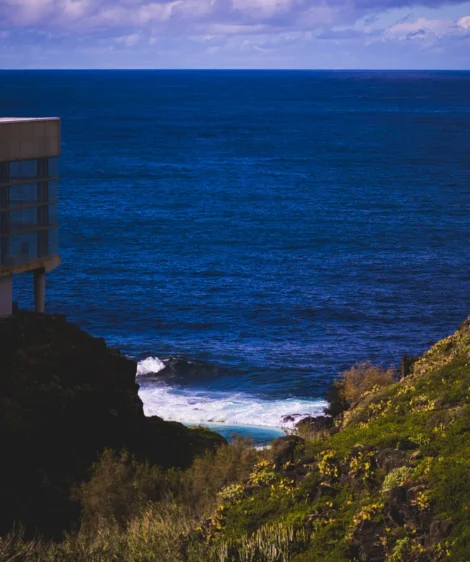 Building on Cliff Overlooking the Ocean