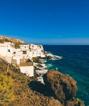 White Building on Cliff by the Ocean