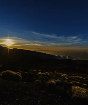 Landscape With Hills and Body of Water in the Distance