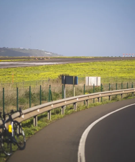Road With Bike Rack and Grass on the Side