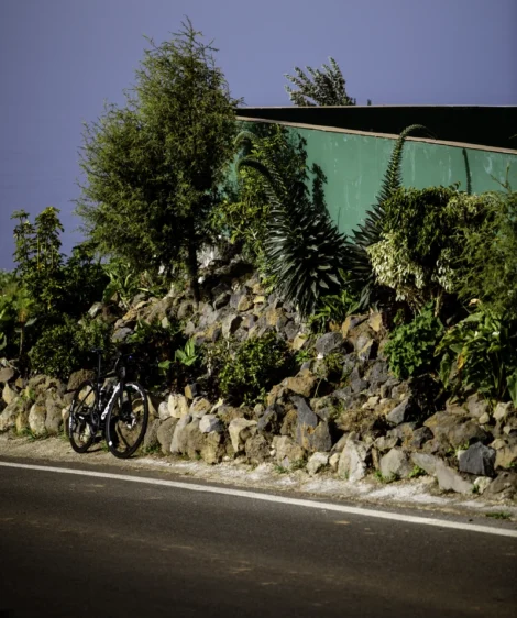Motorcycle Parked Next to Wall