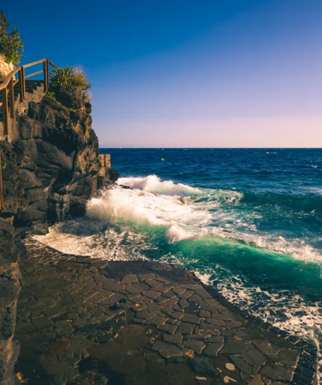 Rocky Beach With Waves Crashing Against the Shore