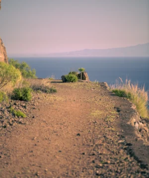 Rocky Arewith Body of Water in the Background