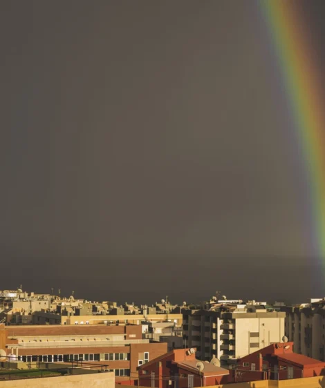 Rainbow Over City