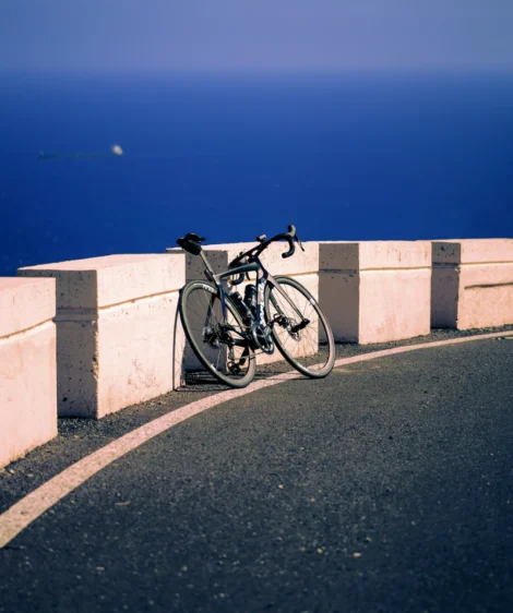 Bicycle Parked on Concrete Wall