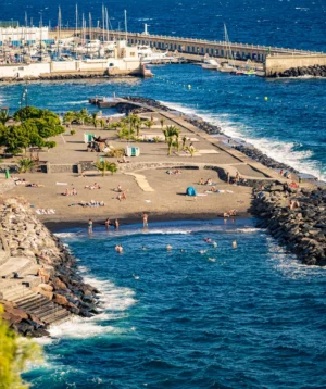 Beach With People and Buildings