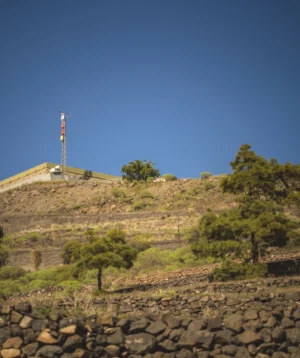 Stone Wall With Tower in the Background