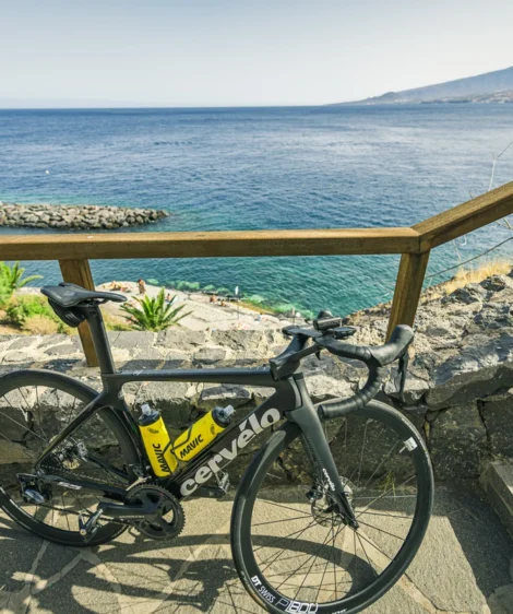 Bicycle Parked on Stone Wall