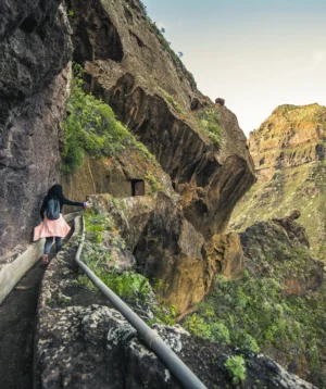 Man Climbing Rock Wall