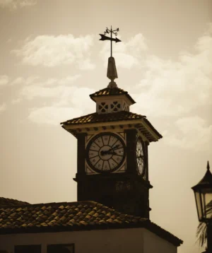 Clock Tower With Weather Vane