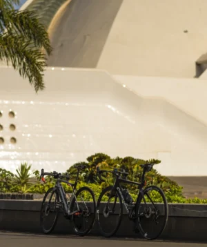Group of Bikes Parked by Waterfall