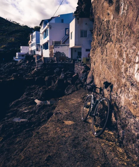 Bicycle Parked on Rocky Hillside
