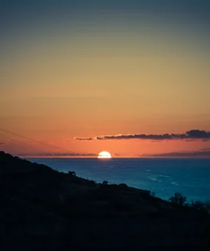Sunset Over Body of Water