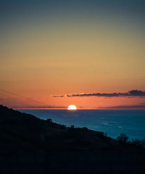 Sunset Over Body of Water