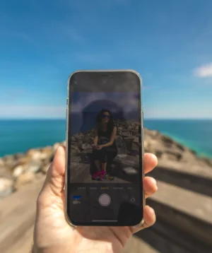 Person Holding Cell Phone