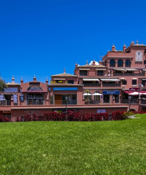 Large Building With Lawn in Front of It
