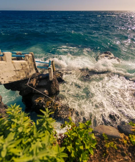 Rocky Beach With Waves Crashing Against the Shore