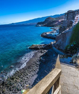 Path Leading to Building on Cliff Over the Ocean