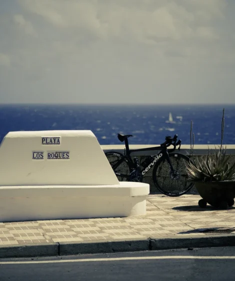 White Couch Next to Bicycle