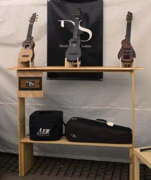 Shelf With Guitars and Guitar on It